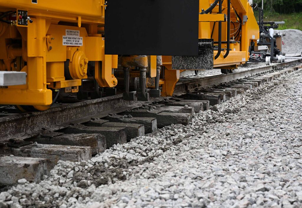 Closeup on specialty rail vehicle on tracks